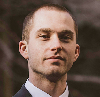 Analista de trading y experto en mercado cripto Thomas Whitfield, headshot.